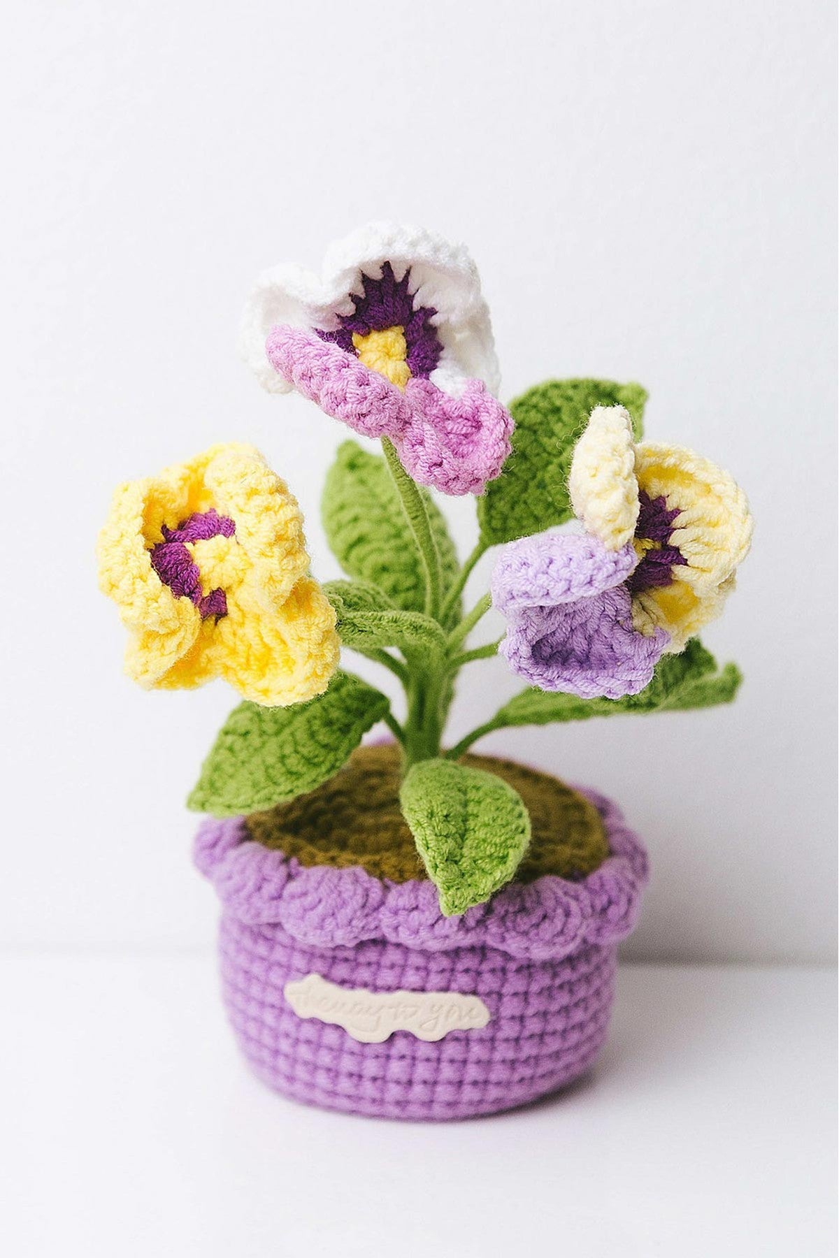 Handcrafted crochet pansy flower in miniature terracotta pot by The Way To You — Urban Wild