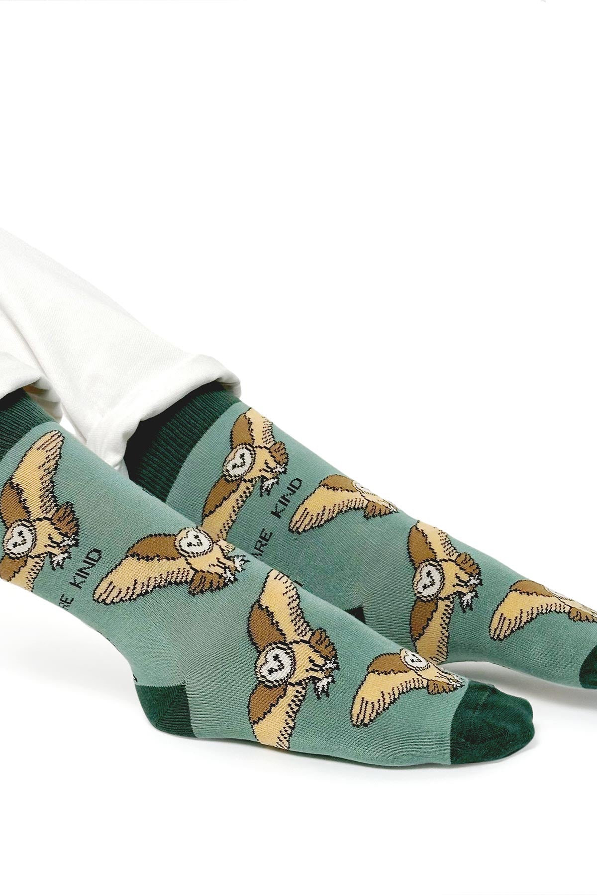 Green bamboo barn owl crew socks worn with white trousers — Urban Wild