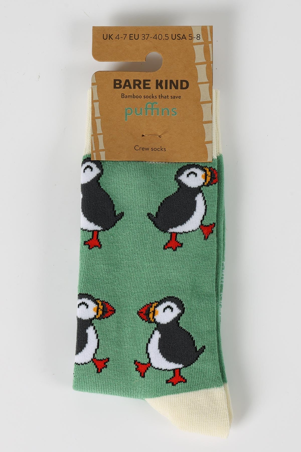 Green bamboo crew socks with puffin print in Bare Kind packaging — Urban Wild
