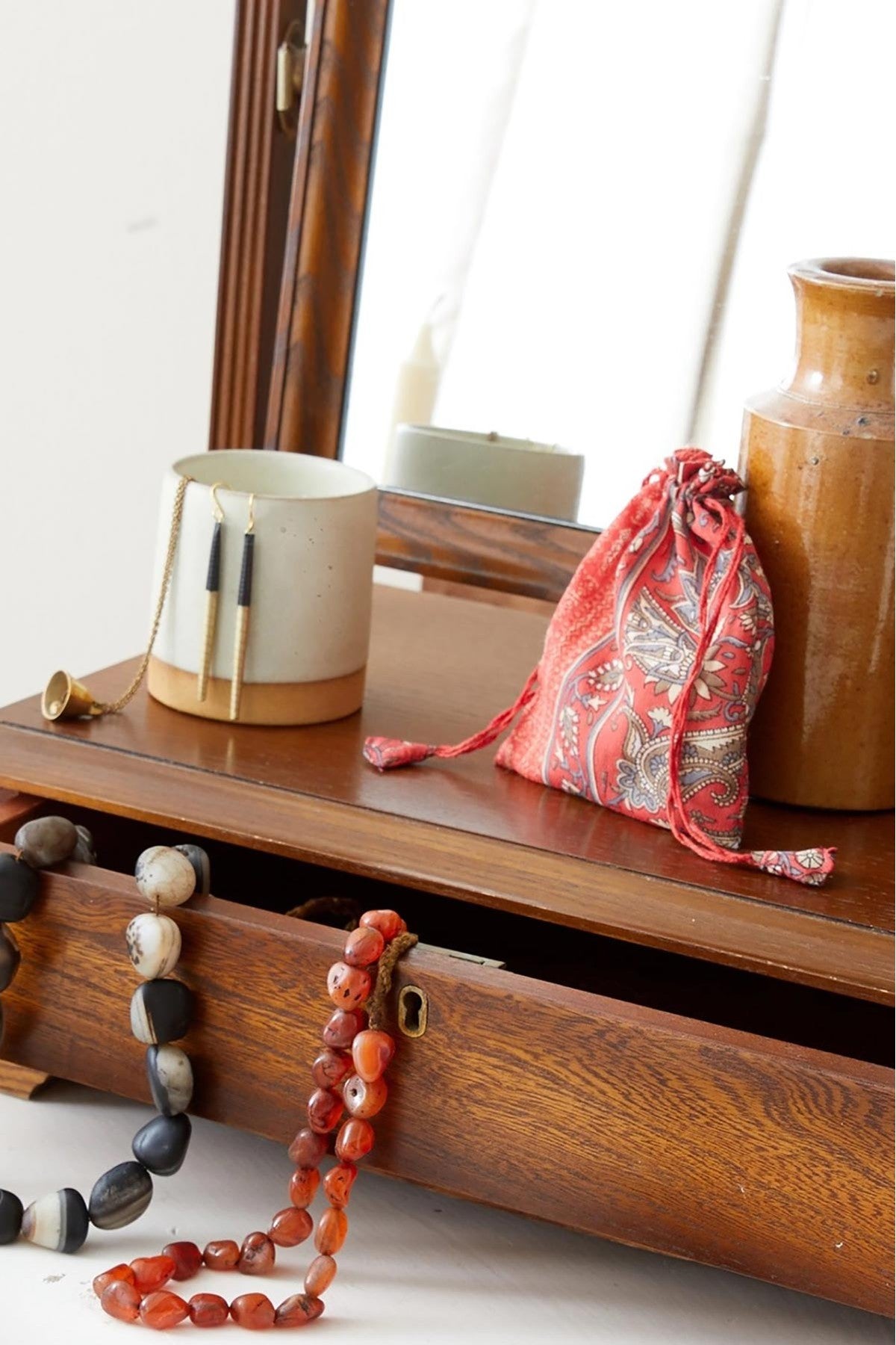 AURA QUE recycled sari lavender bags styled on a dressing table with accessories — Urban Wild
