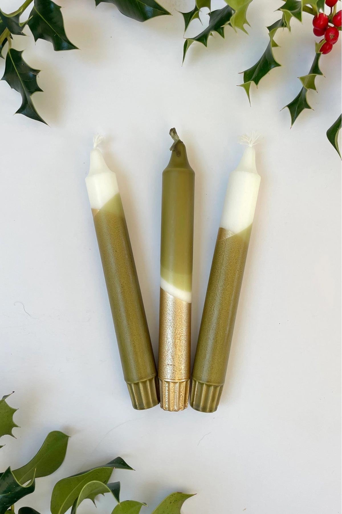 Close up of hand dipped olive green and metallic gold candle finish — Urban Wild