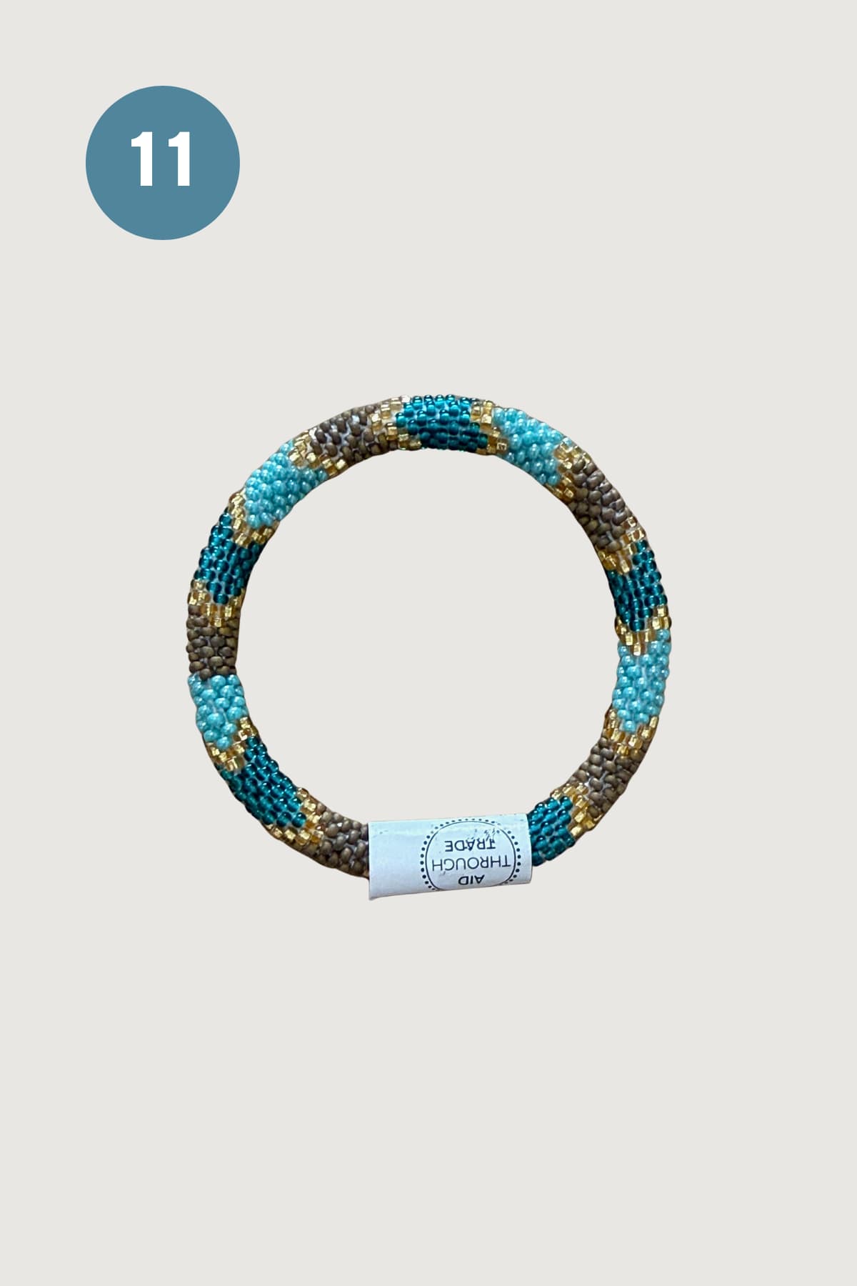 Turquoise teal and gold striped beaded roll-on bracelet — Urban Wild