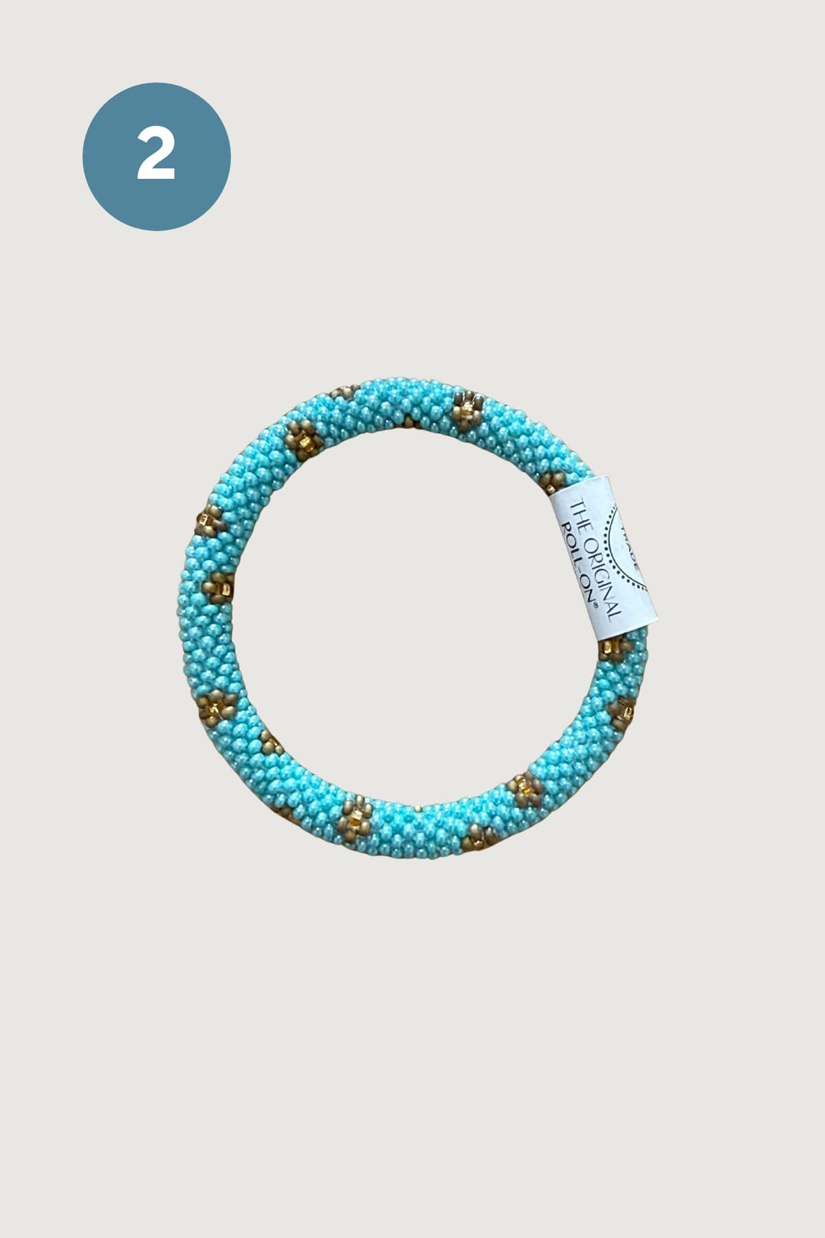Turquoise beaded roll-on bracelet with gold accents fair trade — Urban Wild