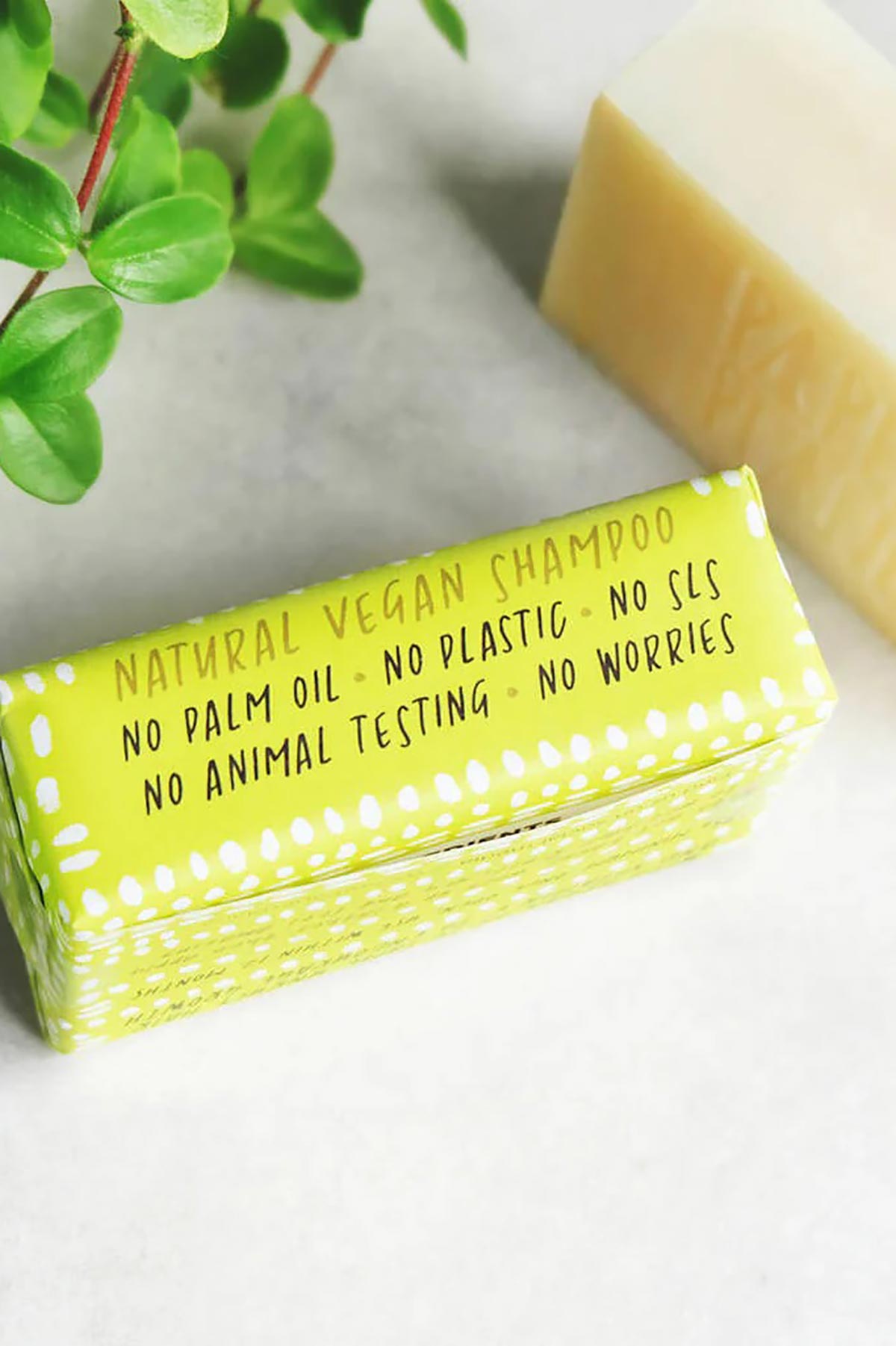 Natural vegan shampoo bar end label showing no palm oil, no plastic, no SLS — Urban Wild