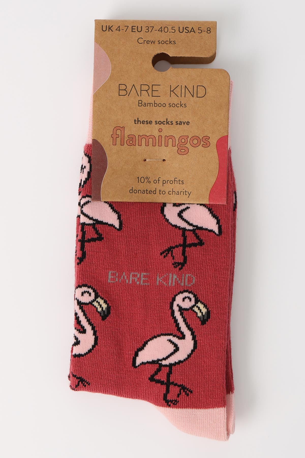 Pink flamingo bamboo crew socks by Bare Kind in plastic free kraft packaging — Urban Wild