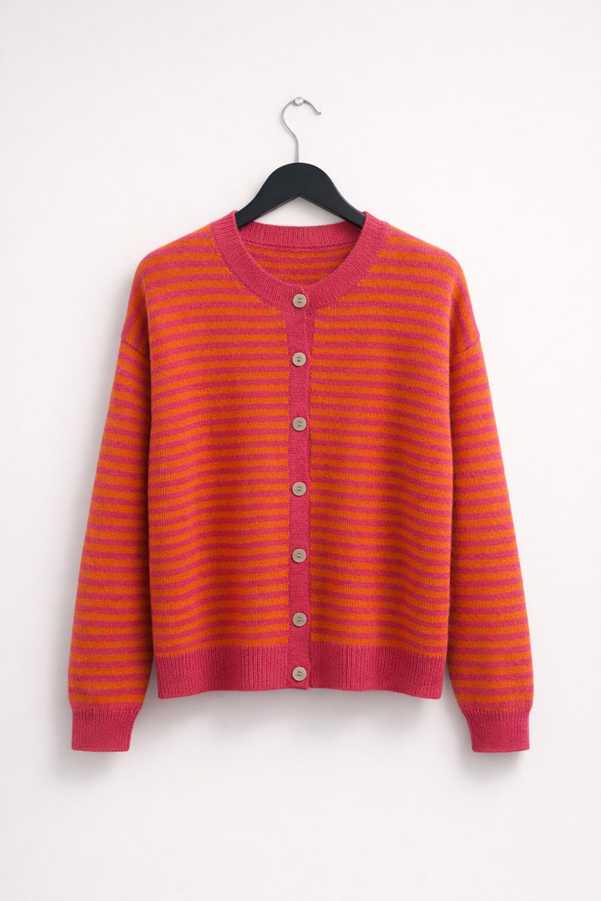 Pink and orange striped knit cardigan by Urban Wild available at Urban Wild UK