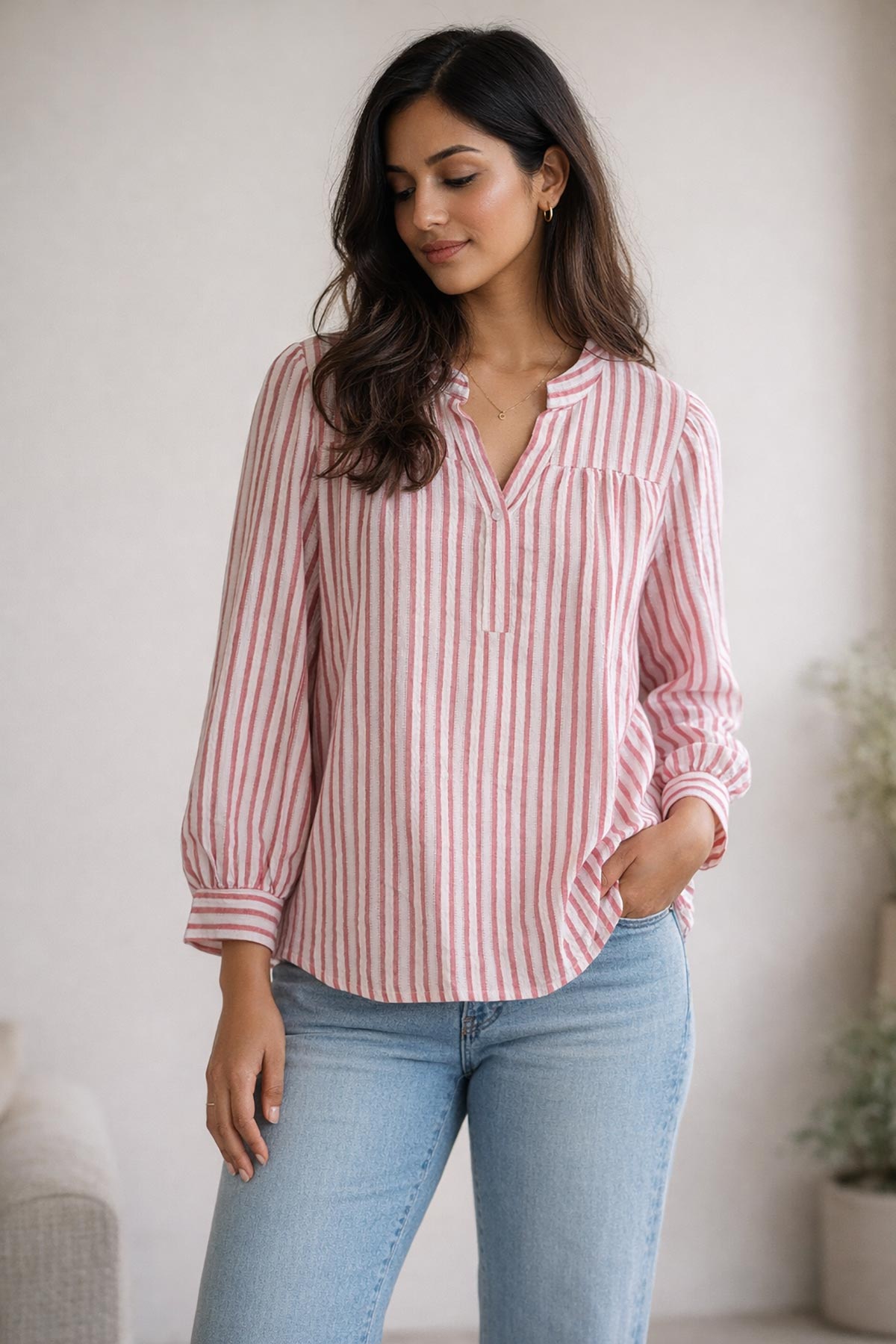 Close-up of 100% cotton pink stripe blouse fabric