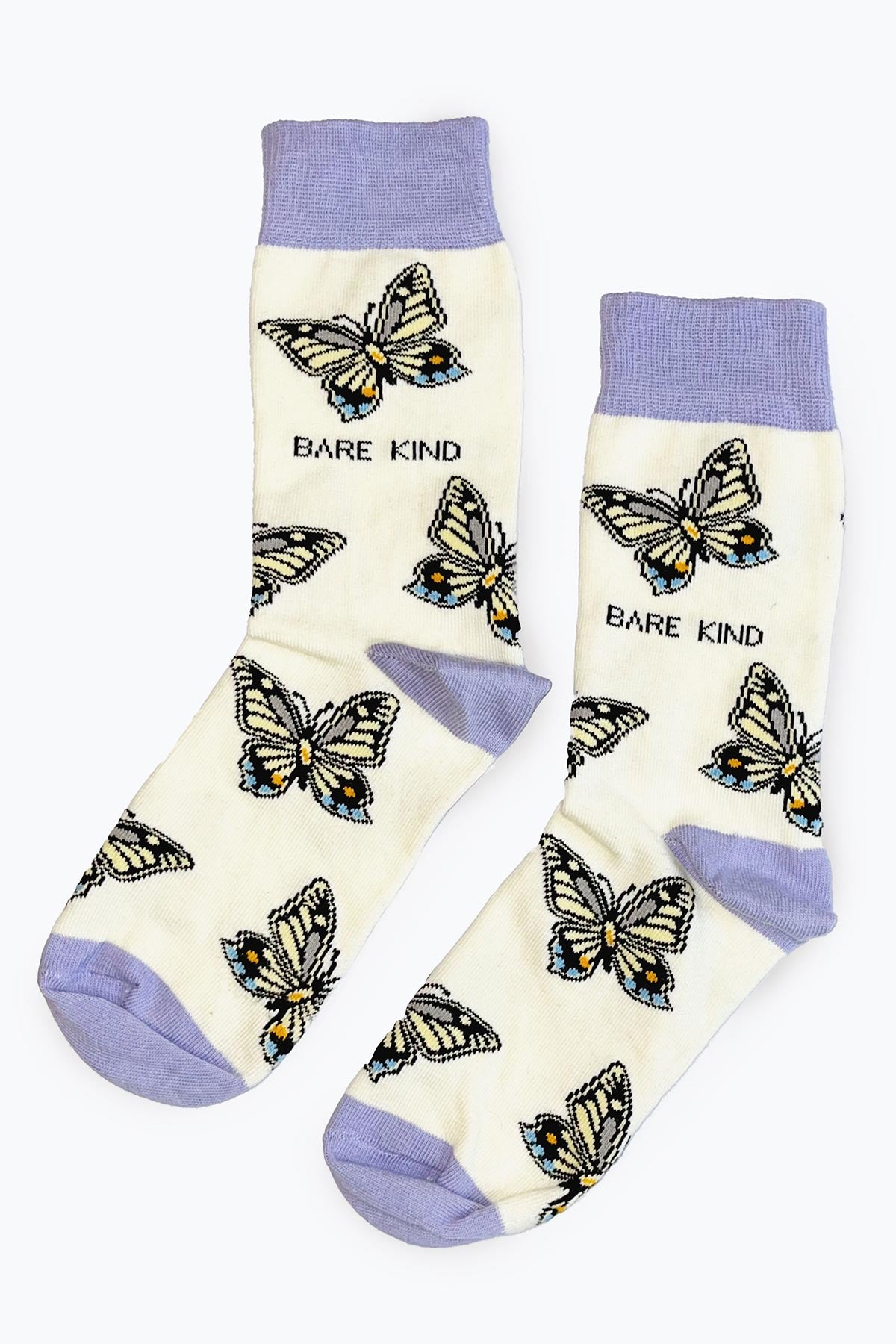 Pair of Bare Kind butterfly bamboo crew socks in cream and purple flat lay — Urban Wild