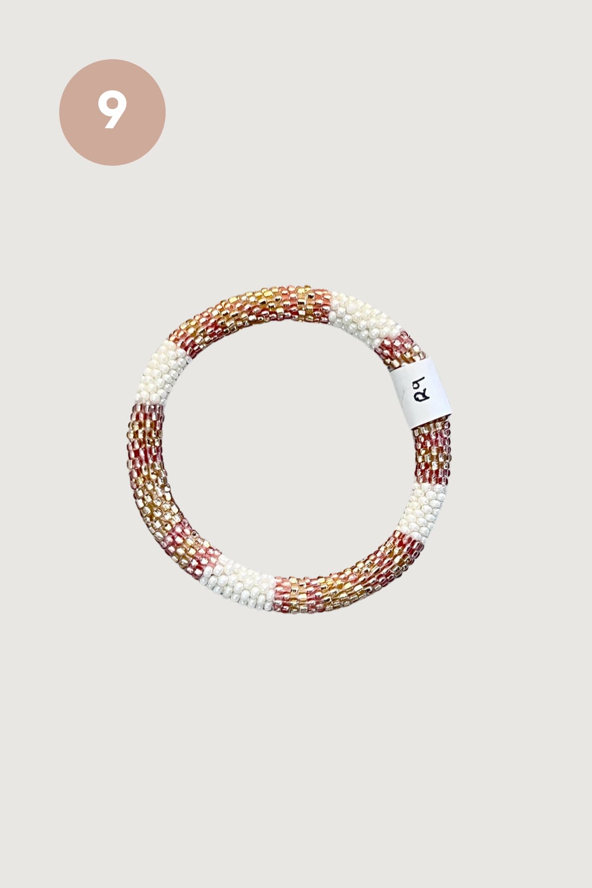 Rose gold and ivory striped beaded Roll-On bracelet design nine fair trade - Urban Wild