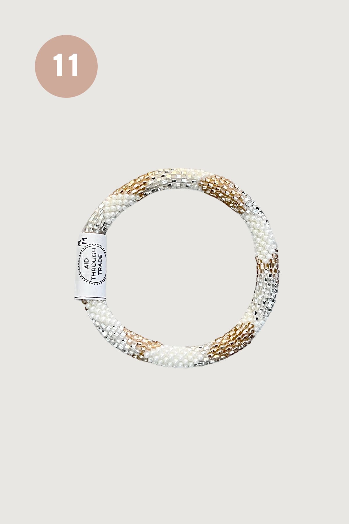 Ivory silver and gold beaded Roll-On bracelet design eleven fair trade Nepal - Urban Wild