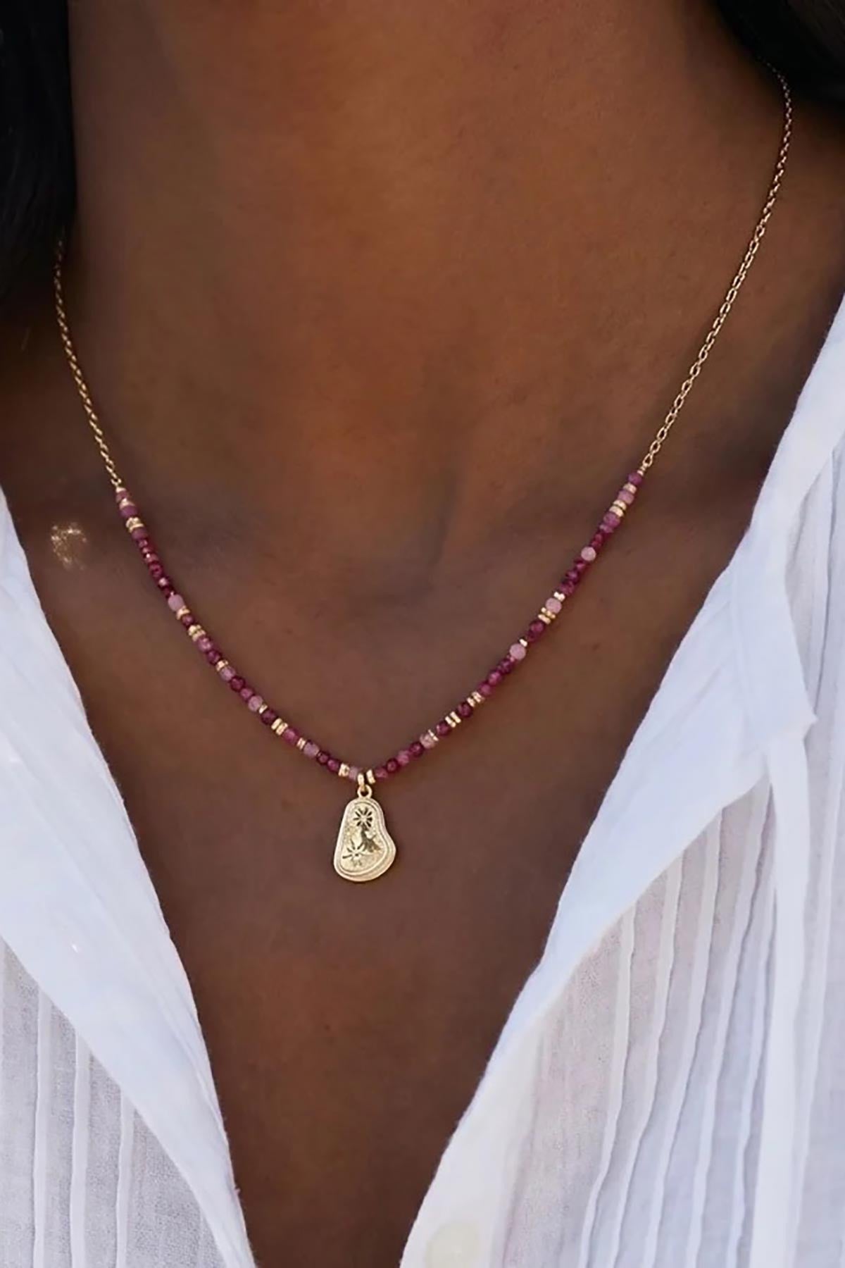 Ruby and garnet gold beaded pendant necklace with celestial charm detail — Urban Wild