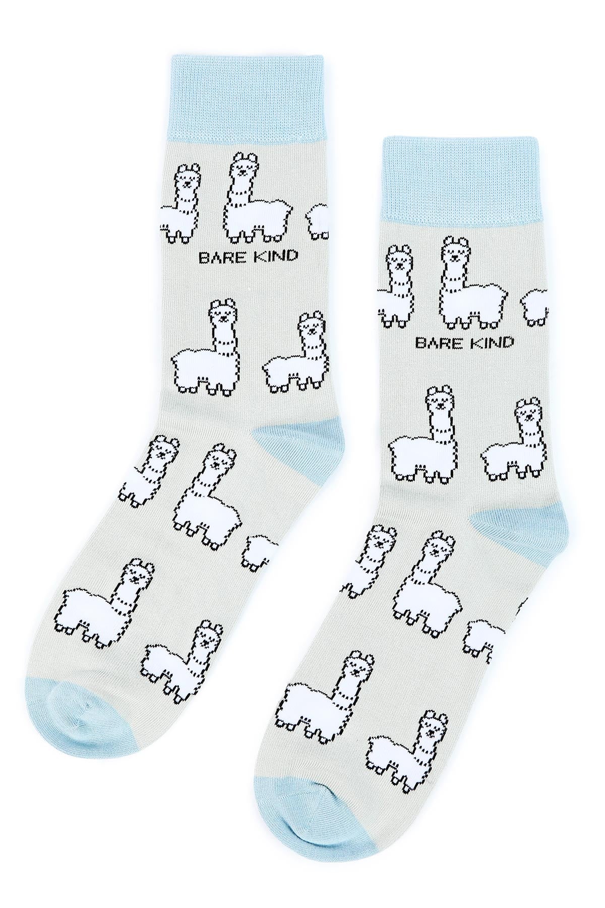Pair of sage and pastel blue alpaca bamboo crew socks laid flat — Urban Wild