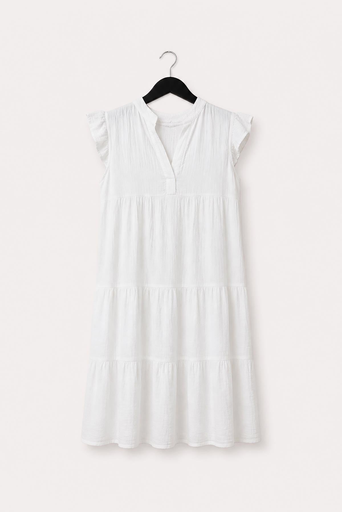 White cotton tiered dress with soft frill sleeve detail by Urban Wild